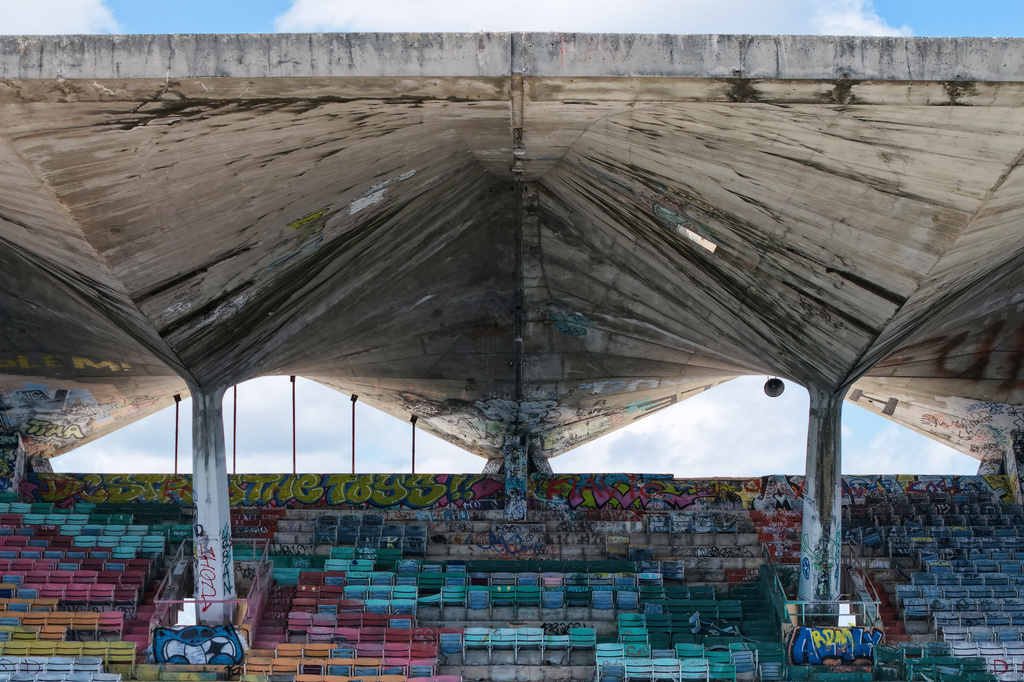The Miami Marine Stadium's seats are shaded by a concrete cantilevered roof Tuesday Aug. 11, 2026, in Miami. (AP Photo/Daniel Kozin)