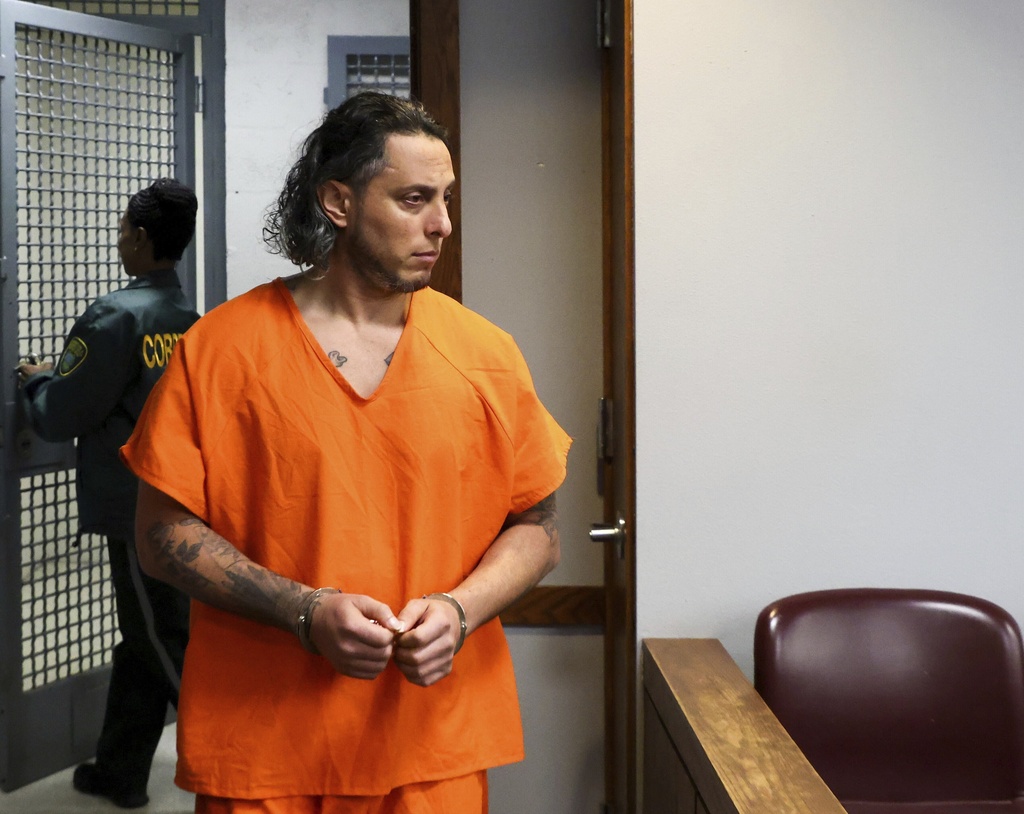 Oscar Olea enters the courtroom as Judge Alberto Milian decides if to grant his plea deal with the State on Thursday, Aug. 21, 2025, at the Richard E. Gerstein Justice Building in Miami, Fla. (Carl Juste/Miami Herald via AP, Pool)