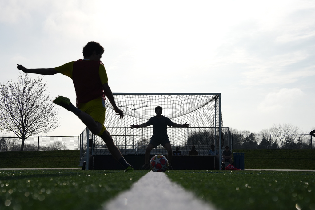 People play soccer at Stony Brook University in Stony Brook, N.Y., Friday, April 3, 2026. (AP Photo/Ryan Murphy)