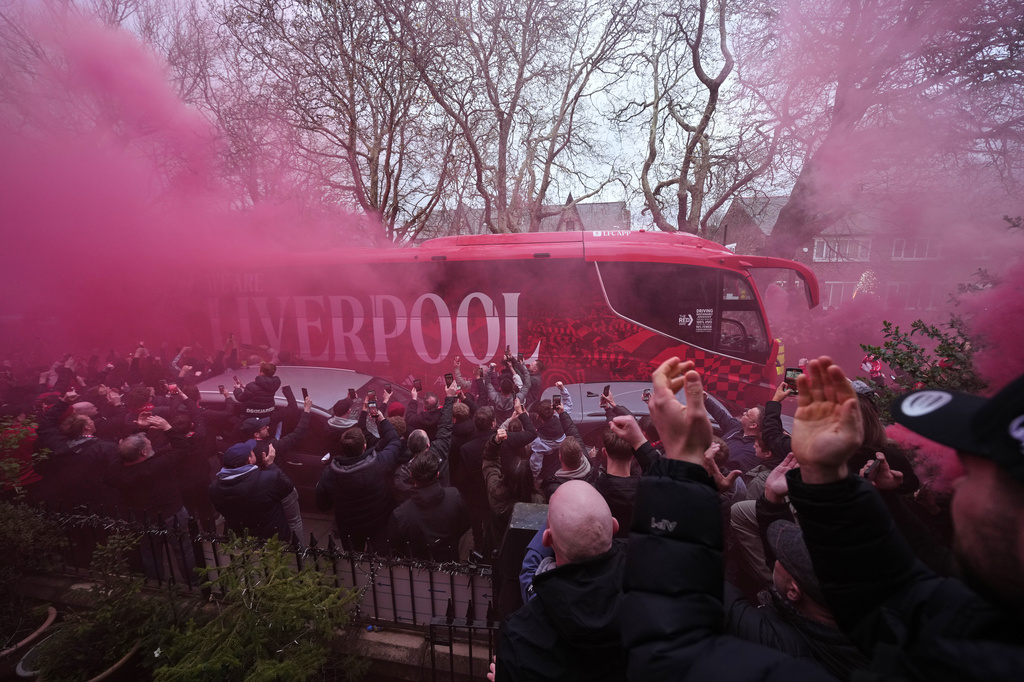 Liverpool players arrive for the Champions League quarterfinal second leg soccer match between Liverpool and Paris Saint-Germain in Liverpool, England, Tuesday, April 14, 2026. (AP Photo/Jon Super)