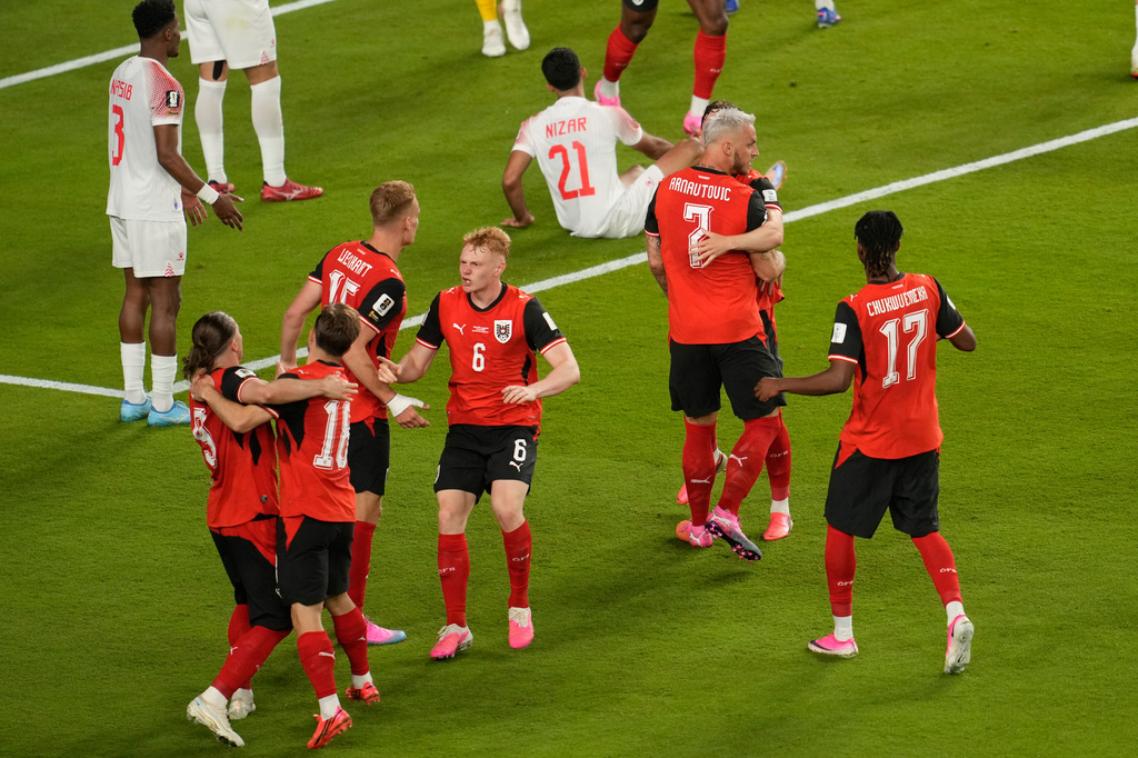 Austria players celebrate after Jordan's Yazan Alarab scored on his own goal during the World Cup Group J soccer match in Santa Clara, Calif., near San Francisco, Tuesday, June 16, 2026. (AP Photo/Jeff Chiu)