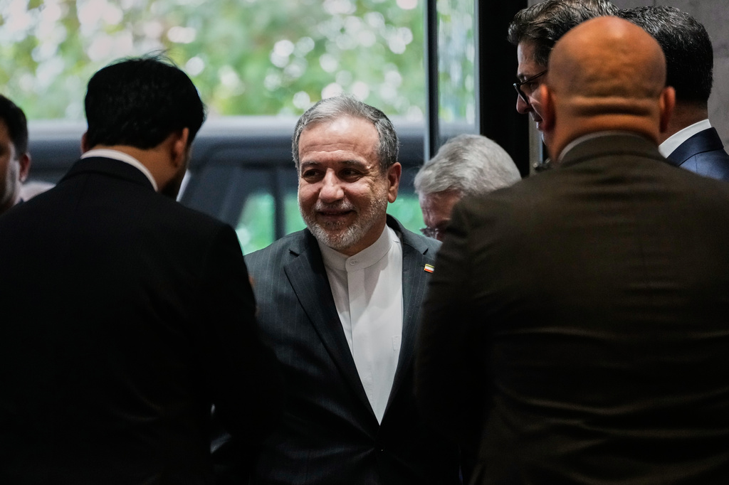 Iranian Foreign Minister Abbas Araghchi, center, arrives to meet his Iraqi counterpart Fouad Hussein in Baghdad, Iraq, Sunday, June 28, 2026. (AP Photo/Hadi Mizban)