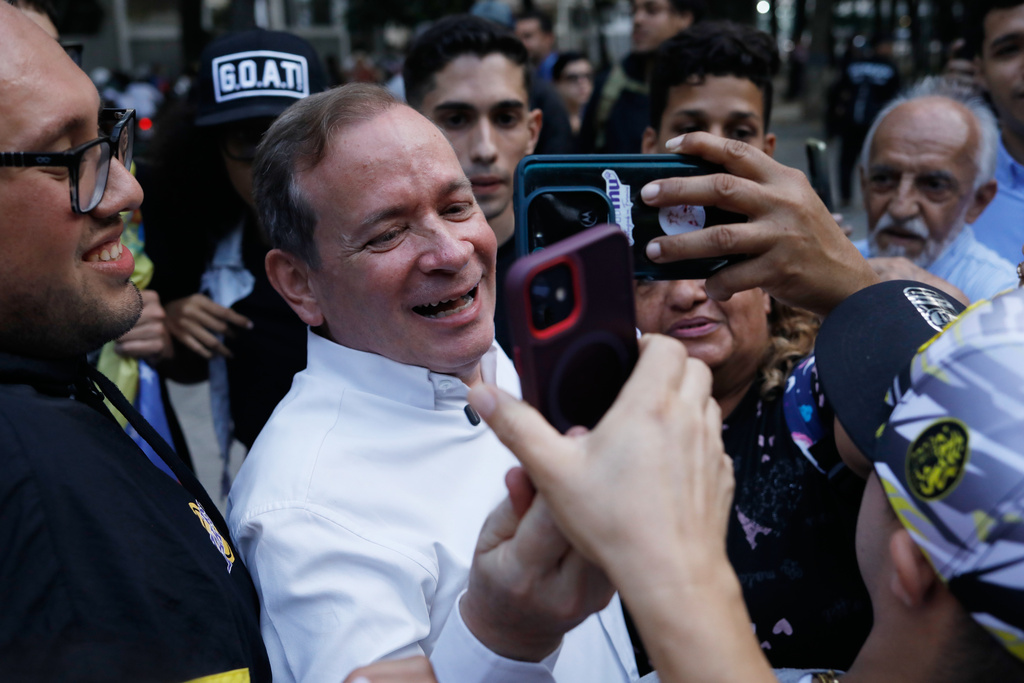 Opposition leader Juan Pablo Guanipa records a video message to supporters after his release from prison in Caracas, Venezuela, Sunday, Feb. 8, 2026. (AP Photo/Cristian Hernandez)