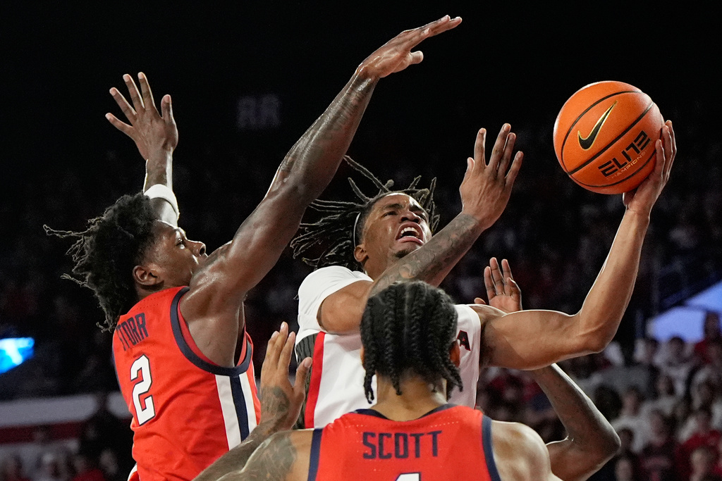 Georgia guard Jeremiah Wilkinson (5) shoots the ball in the first half during an NCAA college basketball game against Mississippi, Wednesday, Jan. 14, 2026, in Athens, Ga. (AP Photo/Brynn Anderson)