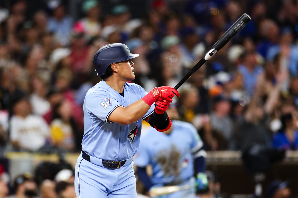 Toronto Blue Jays' Kazuma Okamoto watches his three-run home run against the Toronto Blue Jays in the fifth inning of a baseball game Friday, July 10, 2026, in San Diego. (AP Photo/Derrick Tuskan)