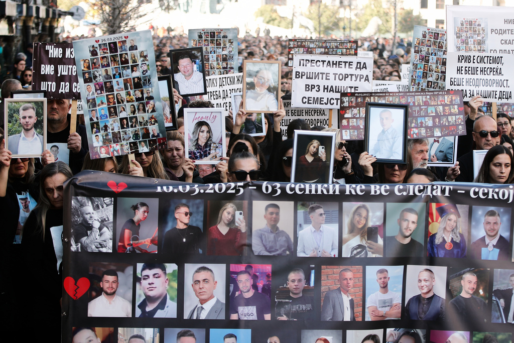 People and relatives of the Kocani nightclub fire victims march peacefully during a protest in Skopje, North Macedonia, on Saturday, Nov. 15, 2025, just a few days before the start of the trial for the fire. (AP Photo/Boris Grdanoski)