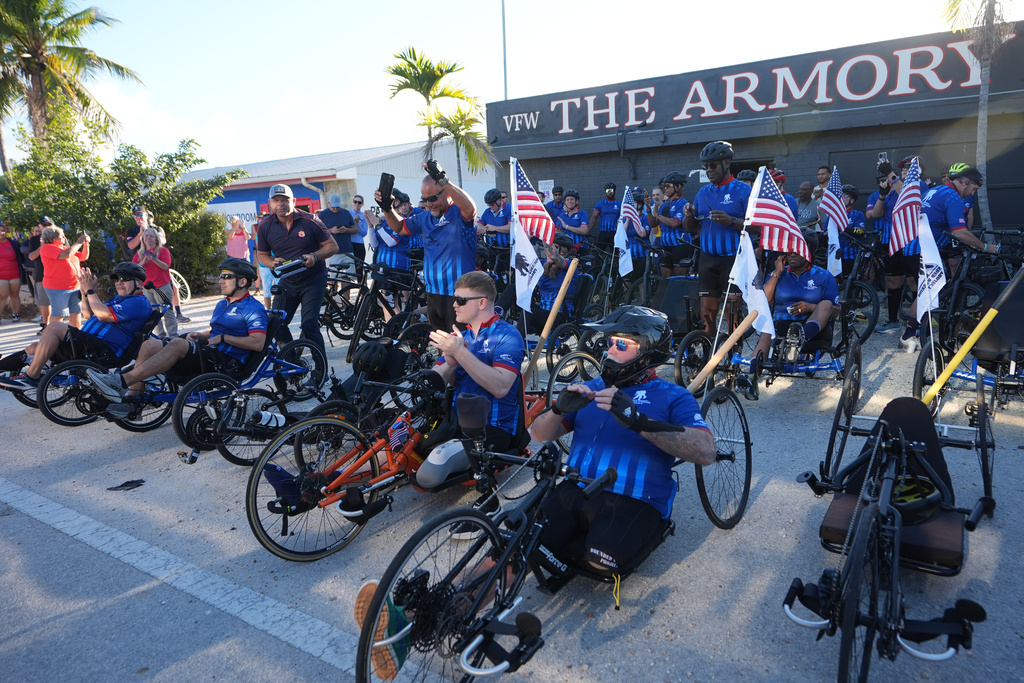 Wounded veterans prepare to start their ride in the annual Florida Keys Soldier Ride organized by the Wounded Warrior Project, Friday, Jan. 9, 2026, in Key Largo, Fla. (AP Photo/Lynne Sladky)