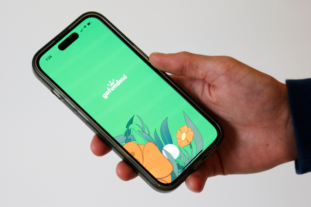 FILE - The home page for the crowdfunding platform GoFundMe is shown on a device in New York, Oct. 16, 2024. (AP Photo/Peter Morgan, File)