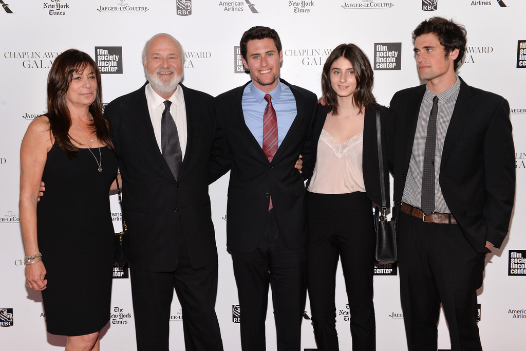 CORRECTS IDENTITY OF NICK AND JAKE REINER - FILE - Honoree Rob Reiner, second left, poses with his wife Michele, left, and children Jake, center, Romy, and Nick at the 41st annual Chaplin Award Gala at Avery Fisher Hall, April 28, 2014, in New York. (Photo by Evan Agostini/Invision/AP, File)