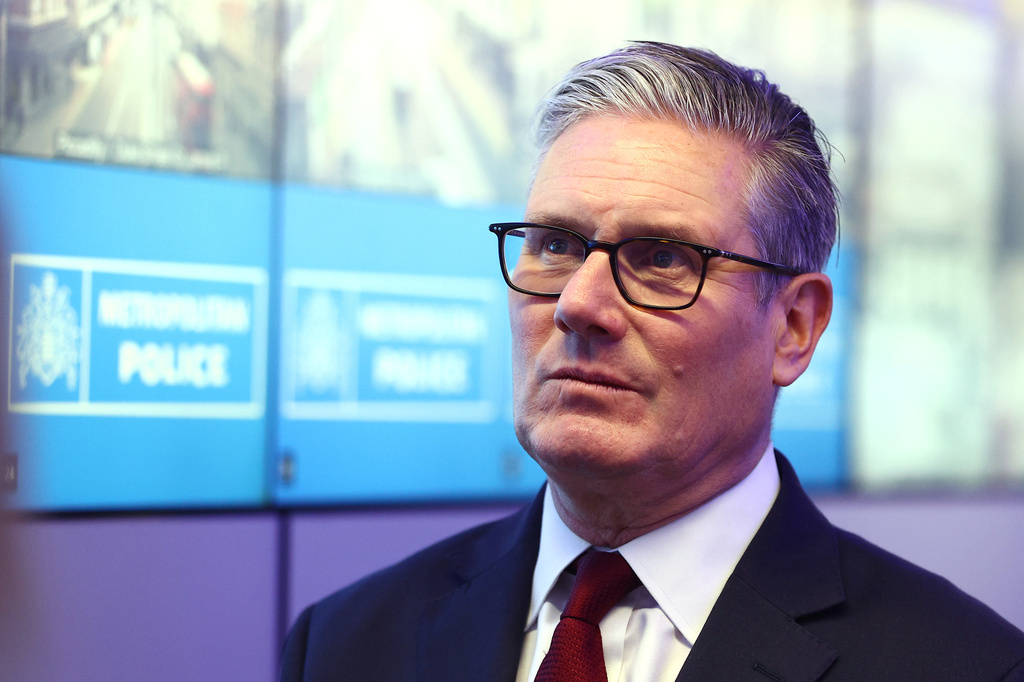 British Prime Minister Keir Starmer meets police officers to discuss operational planning, in London, Friday, May 15, 2026. (Peter Nicholls/Pool Photo via AP)