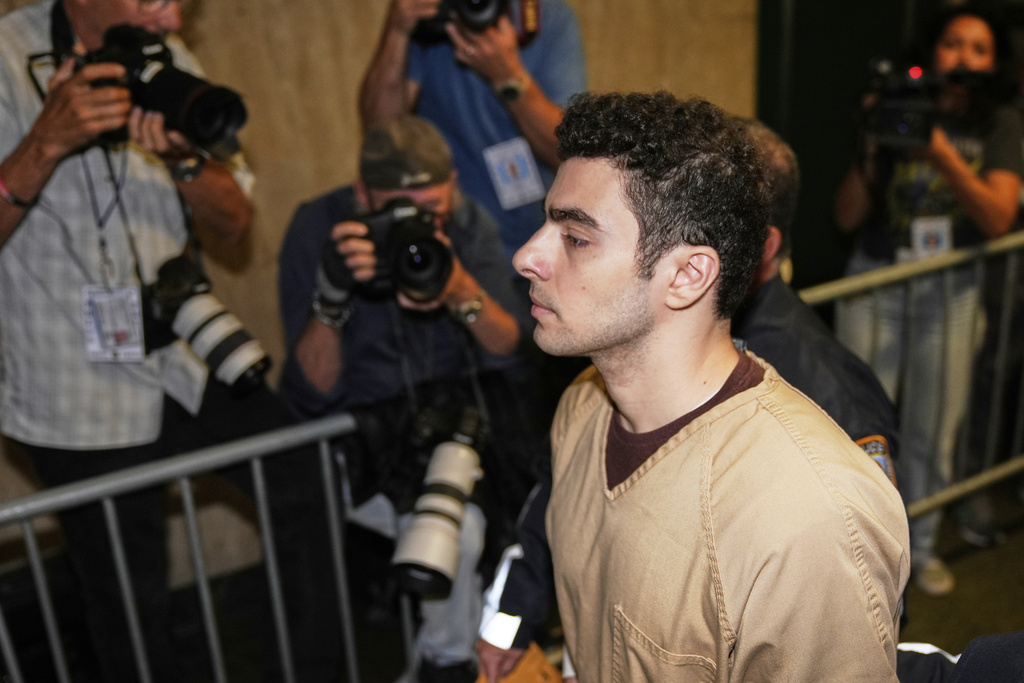 Luigi Mangione is escorted into Manhattan state court in New York, Tuesday, Sept. 16, 2025. (AP Photo/Seth Wenig)