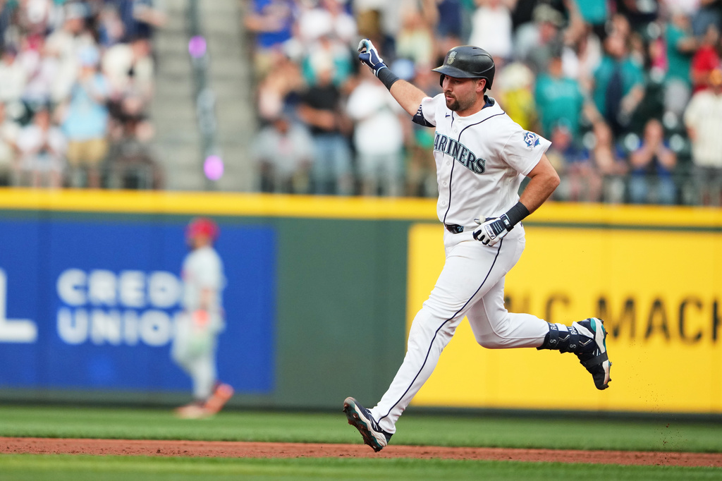 Seattle Mariners' Cal Raleigh jogs the bases after hitting a solo home run against the Philadelphia Phillies during the second inning of a baseball game, Tuesday, Aug. 25, 2026, in Seattle. (AP Photo/Lindsey Wasson)