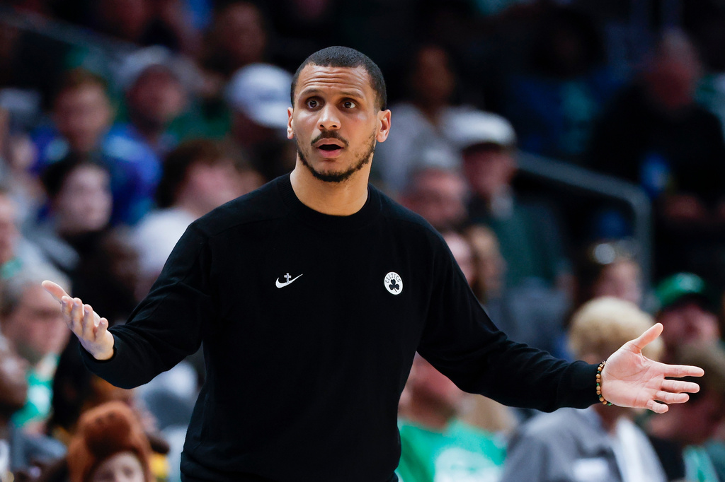 Boston Celtics head coach Joe Mazzulla reacts during the second half of an NBA basketball game against the Charlotte Hornets in Charlotte, N.C., Sunday, March 29, 2026. (AP Photo/Nell Redmond)