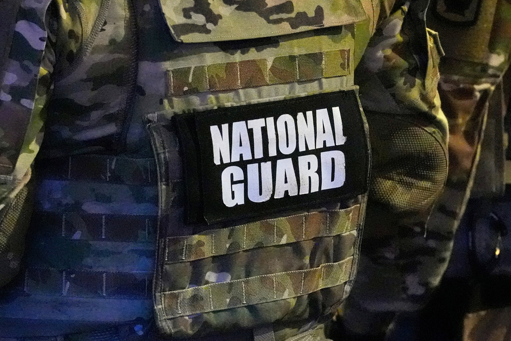 FILE - A member of the National Guard stands watch on Beale St., July 17, 2026, in Memphis, Tenn. (AP Photo/George Walker IV, File)