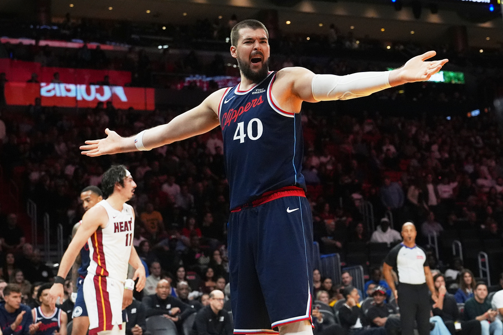 Los Angeles Clippers center Ivica Zubac (40) reacts to a call during the second half of an NBA basketball game against the Miami Heat, Monday, Dec. 1, 2025, in Miami. (AP Photo/Lynne Sladky)