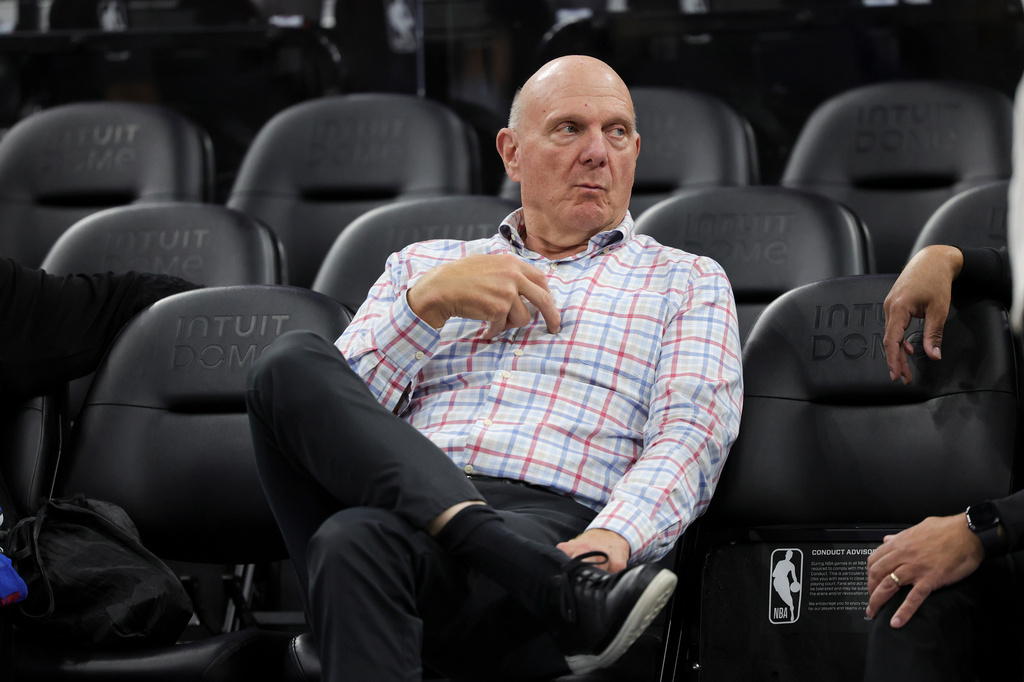 FILE - Los Angeles Clippers owner Steve Ballmer sits on the sideline before an NBA basketball game against the Chicago Bulls on March 13, 2026, in Inglewood, Calif. (AP Photo/Ryan Sun, File)