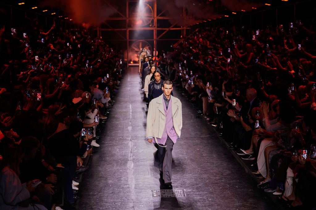 Models wear creations from Diesel's Spring-Summer 2027 collection presented in Milan, Italy, Tuesday, Sept. 22, 2026. (AP Photo/Luca Bruno)