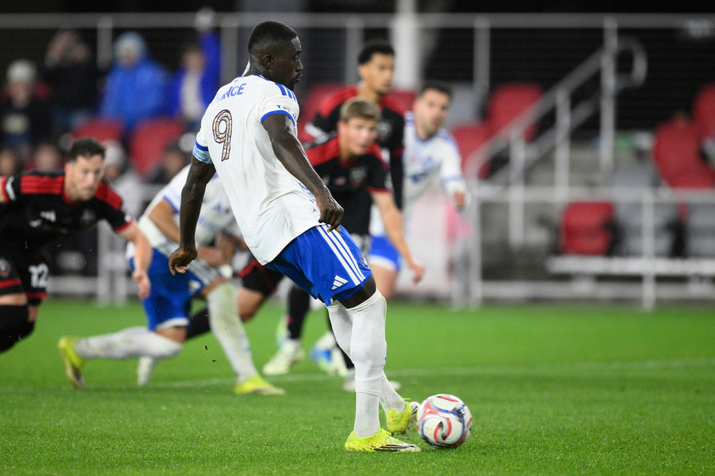 CF Montreal forward Prince Owusu (9) kicks a penalty shot for a goal during the second half of an MLS soccer match against D.C. United, Saturday, May 23, 2026, in Washington. (AP Photo/Nick Wass)