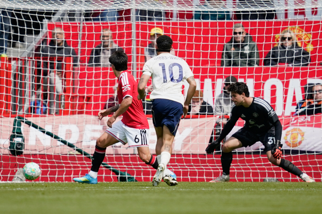 Nottingham Forest's Morgan Gibbs-White, centre, scores his side's second goal during the English Premier League soccer match between Manchester United and Nottingham Forest in Manchester, England, Sunday, May 17, 2026. (AP Photo/Dave Thompson)