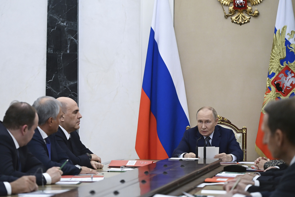 Russian President Vladimir Putin, center, chairs a Security Council meeting at the Kremlin in , Russia, Monday, Sept. 22, 2025. (Alexander Kazakov, Sputnik, Kremlin Pool Photo via AP)