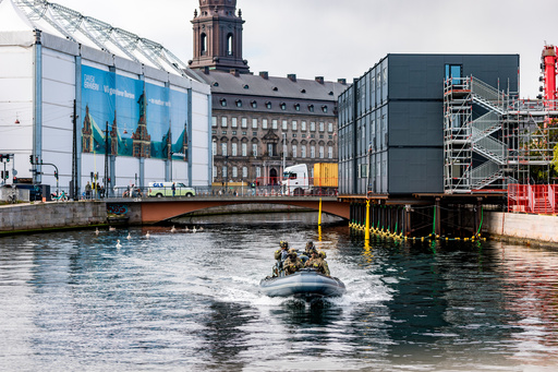 Security on a dinghy boat around the Danish parliament at Christiansborg Castle in Copenhagen as Denmark is hosting an informal summit for the EUs heads of state and government, Wednesday, Oct. 1, 2025 . (Steven Knap/Ritzau Scanpix via AP) Security on a dinghy boat around the Danish parliament at Christiansborg Castle in Copenhagen as Denmark is hosting an informal summit for the EUs heads of state and government, Wednesday, Oct. 1, 2025 . (Steven Knap/Ritzau Scanpix via AP)