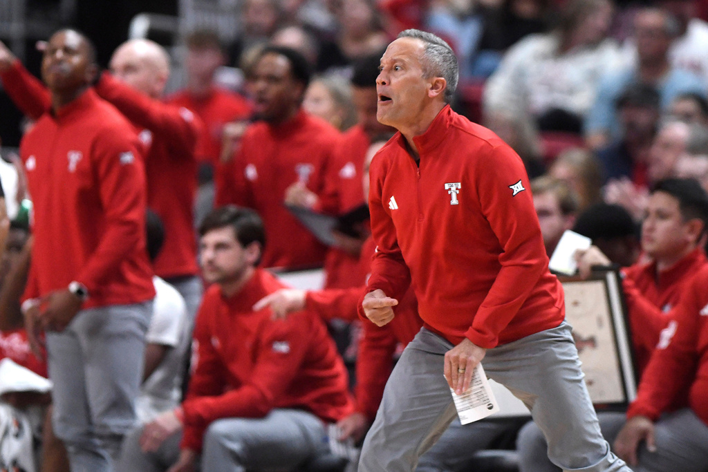 Texas Tech head coach Grant McCasland yells instructions on the sidelines during the first half in an NCAA college basketball game against Lindenwood, Tuesday, Nov. 4, 2025, in Lubbock, Texas. (AP Photo/Annie Rice)
