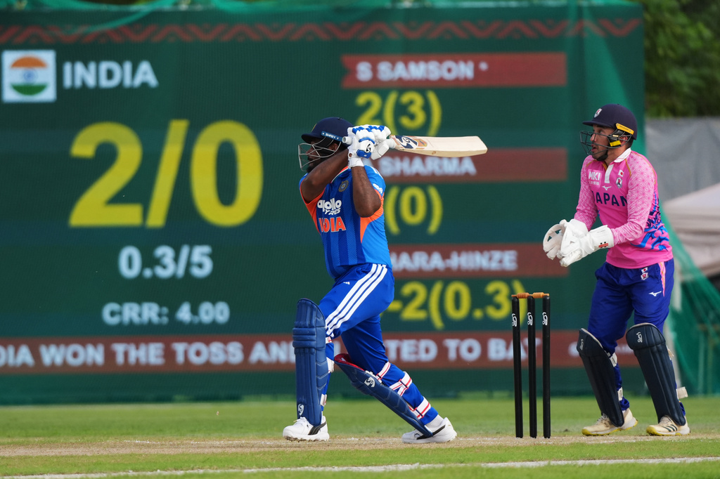 India's Sanju Samson, left, bats against Japan during the Suzuki Cup T20 cricket match in Sano, Japan, Tuesday, Sept. 22, 2026, marking 75 years of diplomatic relations between the two countries. (AP Photo/Tomohiro Ohsumi)