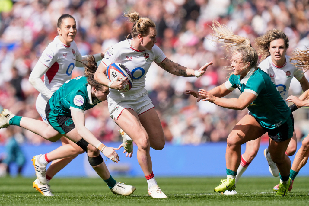 England's Megan Jones, center, in action during the Women's Six Nations Rugby 2026 match, in London, Saturday, April 11, 2026. (Andrew Matthews/PA via AP)
