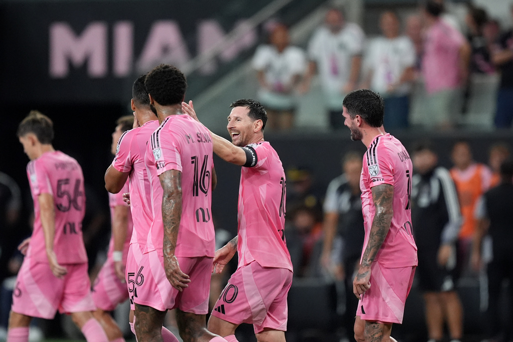 Inter Miami forward Lionel Messi (10) celebrates with teammates after scoring his side's third goal during the first half of a Leagues Cup soccer match against Atletico de San Luis, Wednesday, Aug. 5, 2026, in Miami. (AP Photo/Rebecca Blackwell)
