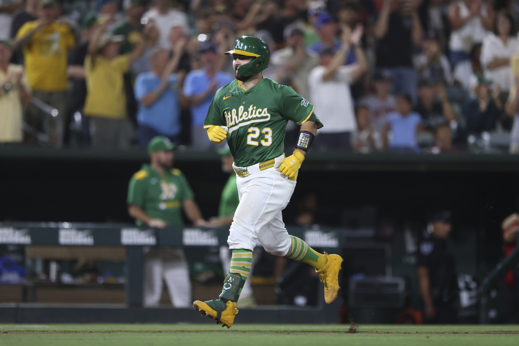 Athletics' Shea Langeliers jogs around the bases after hitting a grand slam during the seventh inning of a baseball game against the Detroit Tigers, Monday, Aug. 25, 2025, in West Sacramento, Calif. (AP Photo/Scott Marshall)