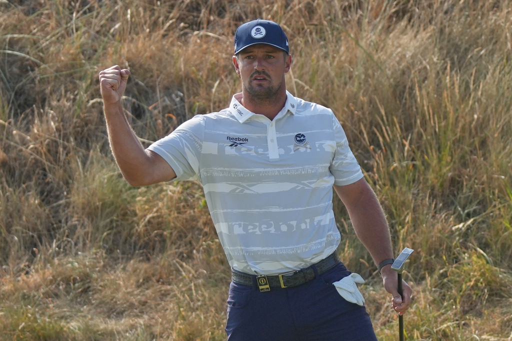 Bryson DeChambeau of the United States reacts after getting a birdie on the 6th green during the third day of the British Open Golf championships at Royal Birkdale golf club, in Southport, England, Saturday, July 18, 2026. (AP Photo/Jon Super)