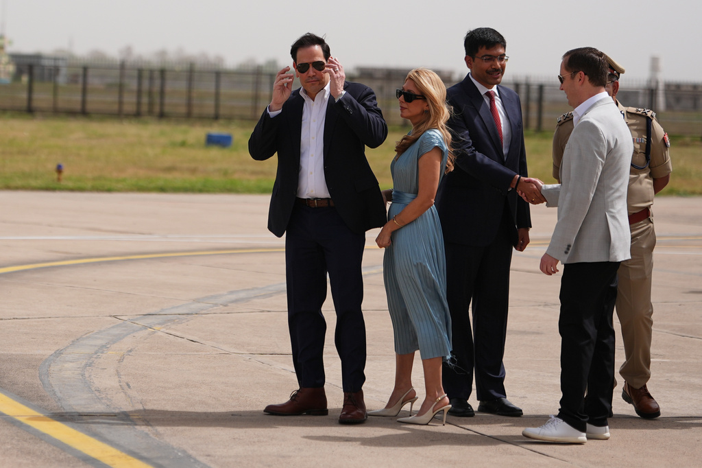 United States Secretary of State Marco Rubio waits with his wife Jeanette Rubio after landing in Agra, India, Monday, May 25, 2026. (AP Photo/Julia Demaree Nikhinson, Pool)