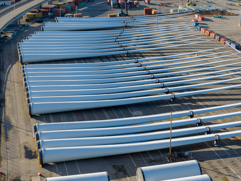 FILE - Wind turbine blades sit at The Portsmouth Marine terminal that is the staging area for Dominion Energy Virginia, which is developing Coastal Virginia Offshore Wind, Dec. 22, 2025, in Portsmouth, Va. (AP Photo/Steve Helber, File)