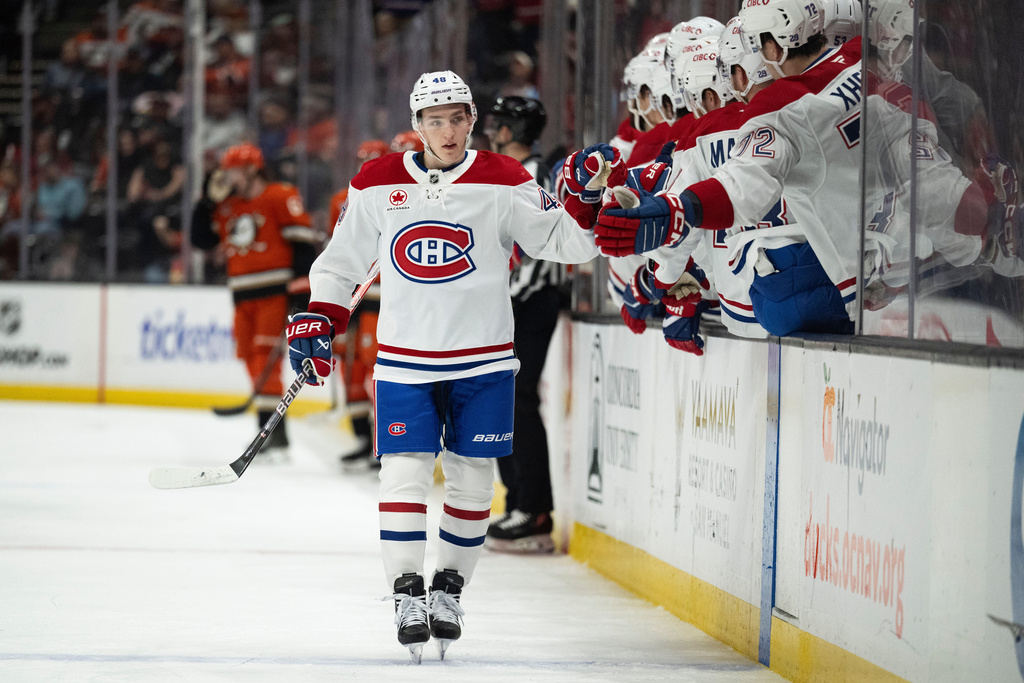 Montreal Canadiens defenseman Lane Hutson celebrates his goal with the bench during the first period of an NHL hockey game against the Anaheim Ducks, Friday, March 6, 2026, in Anaheim, Calif. (AP Photo/Kyusung Gong)