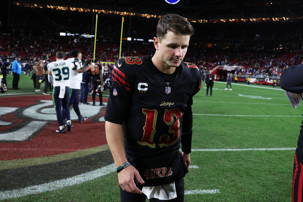 San Francisco 49ers quarterback Brock Purdy (13) walks off the field after an NFL football game against the Seattle Seahawks in Santa Clara, Calif., Saturday, Jan. 3, 2026. (AP Photo/Jed Jacobsohn)