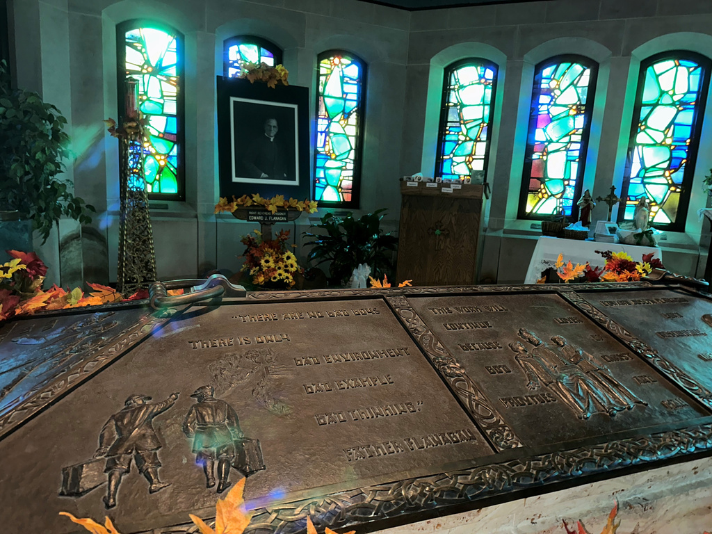 The tomb of the Rev. Edward Flanagan is seen in Dowd Memorial Chapel in Boys Town, Neb., on Sept. 14, 2024. (AP Photo/Peter Smith)