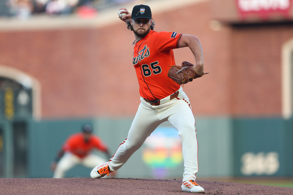 San Francisco Giants pitcher Landen Roupp throws to a Chicago Cubs batter during the first inning of a baseball game Friday, June 12, 2026, in San Francisco, Calif. (AP Photo/Scott Marshall)
