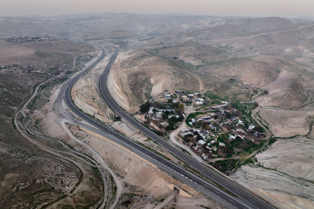 FILE - An aerial view shows the Bedouin hamlet of Khan al-Ahmar in the West Bank, Jan. 24, 2023. (AP Photo/Oded Balilty, File)