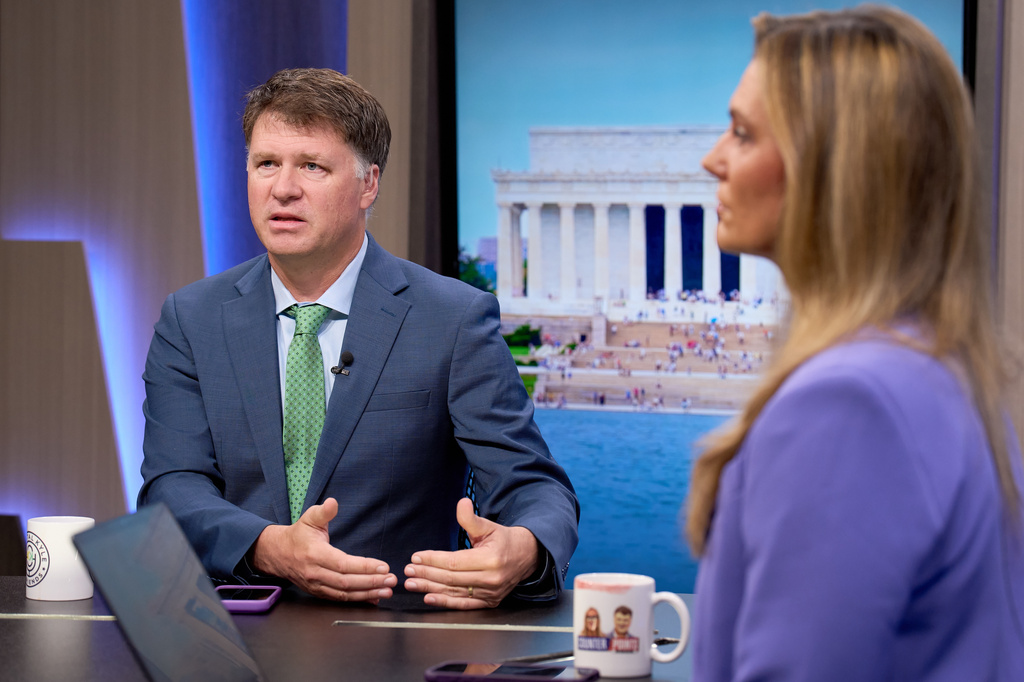 Ryan Grim, left, and Krystal Ball record a segment for the YouTube daily news show, Breaking Points, Monday, July 27, 2026, in Washington. (AP Photo/Jacquelyn Martin)