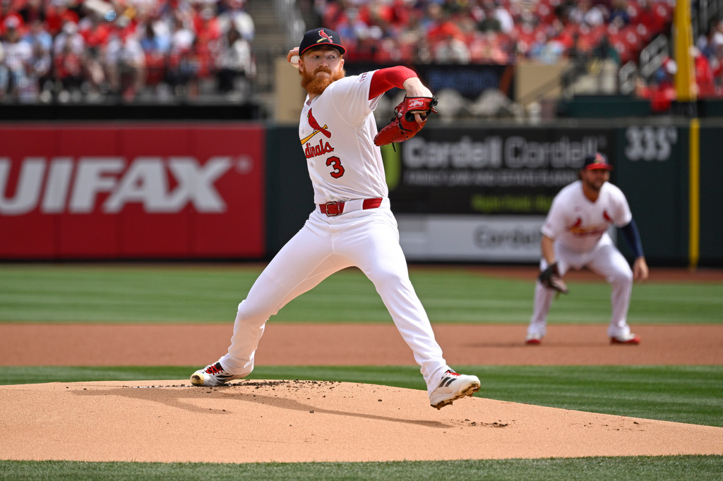 St. Louis Cardinals starting pitcher Dustin May (3) throws in the first inning of a baseball game against the Tampa Bay Rays on Sunday, March 29, 2026, in St. Louis. (AP Photo/Joe Puetz)