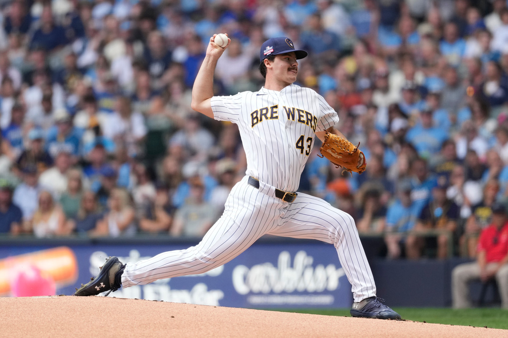 Milwaukee Brewers' Logan Henderson pitches during the first inning of a baseball game against the Atlanta Braves, Saturday, Aug. 22, 2026, in Milwaukee. (AP Photo/Aaron Gash)