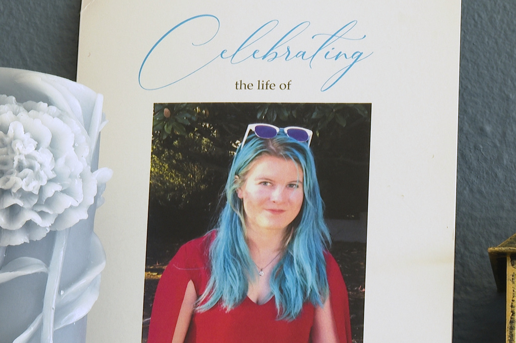 This image from video shows a photo of Emily Normandin-Parker on her memorial program at her parents' home in Seattle, Friday, Sept. 18, 2026. (AP Photo/Manuel Valdes)