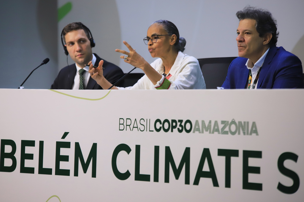 Brazil's Environment Minister Marina Silva, center, Minister of Climate and the Environment of Norway Andreas Bjelland Eriksen, left, and Brazil's Economy Minister Fernando Haddad hold a press conference during the COP30 U.N. Climate Summit, in Belem, Brazil, Thursday, Nov. 6, 2025. (AP Photo/Paulo Santos)