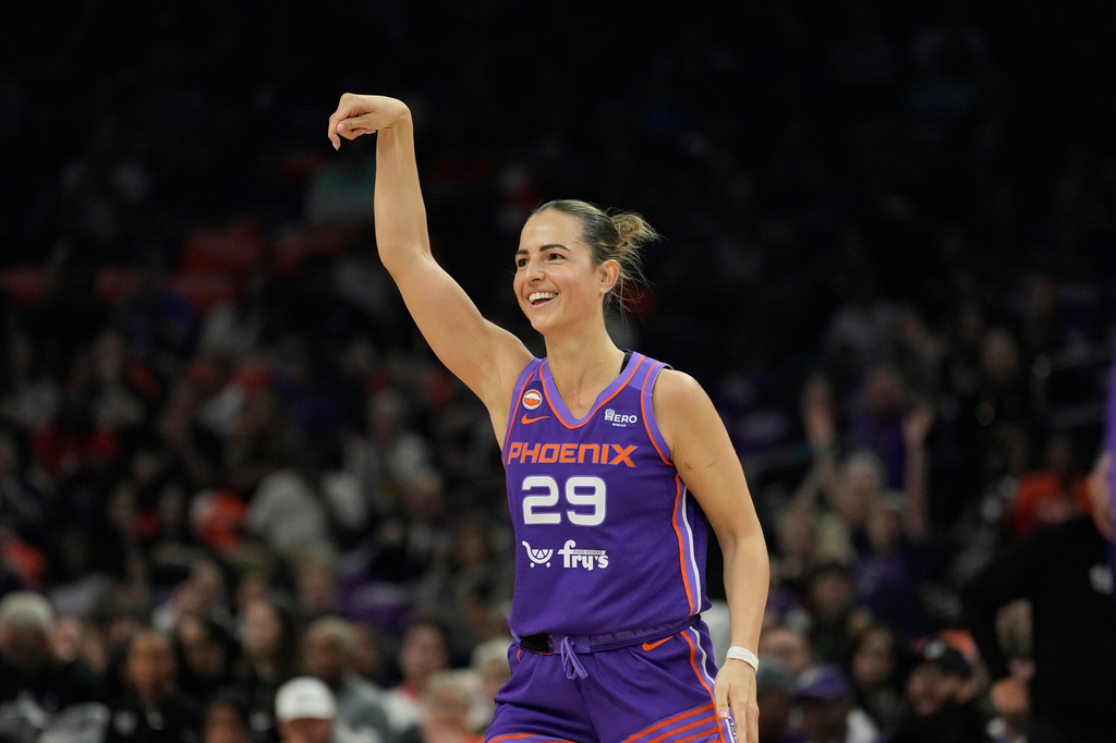 Phoenix Mercury guard Jovana Nogic smiles as she celebrates a 3-pointer against the Chicago Sky during the first half of a WNBA basketball game, Friday, May 15, 2026, in Phoenix. (AP Photo/Ross D. Franklin)