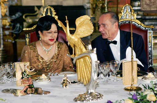 FILE - French President Jacques Chirac, right, speaks with Queen Sirikit of Thailand, at the start of a gala dinner given at the Royal Palace on the first day of his three-day official visit in Bangkok, Thailand, Friday Feb. 17, 2006. (AP Photo/Remy de la Mauviniere, Pool, File) FILE - French President Jacques Chirac, right, speaks with Queen Sirikit of Thailand, at the start of a gala dinner given at the Royal Palace on the first day of his three-day official visit in Bangkok, Thailand, Friday Feb. 17, 2006. (AP Photo/Remy de la Mauviniere, Pool, File)