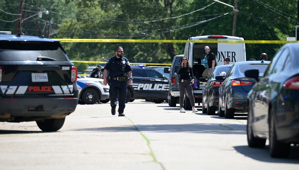 Police tape runs across 79th Street in Shreveport, La., Sunday, April 19, 2026, as police work at the scene of a mass shooting. (Jill Pickett/The Times-Picayune/The New Orleans Advocate via AP)