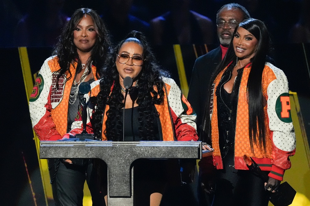 DJ Spinderella, from left, Cheryl James, Hurby Azor and Sandra Denton during the 2025 Rock and Roll Hall of Fame Induction Ceremony on Saturday, Nov. 8, 2025, at L.A. Live in Los Angeles. (AP Photo/Chris Pizzello)