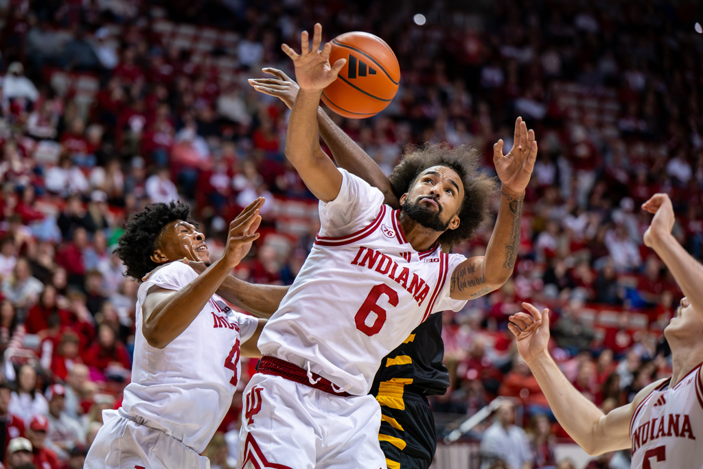 Indiana guard Tayton Conerway (6) battles for a rebound during the first half of an NCAA college basketball game against Bethune-Cookman, Saturday, Nov. 29, 2025, in Bloomington, Ind. (AP Photo/Doug McSchooler)