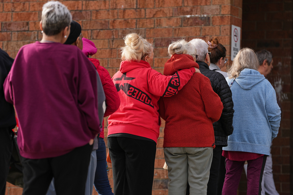 People wait in line durning an emergency food distribution at The Jewish Federation of Greater Philadelphia's Mitzvah Food Program in Philadelphia, Friday, Nov. 7, 2025. (AP Photo/Matt Rourke)
