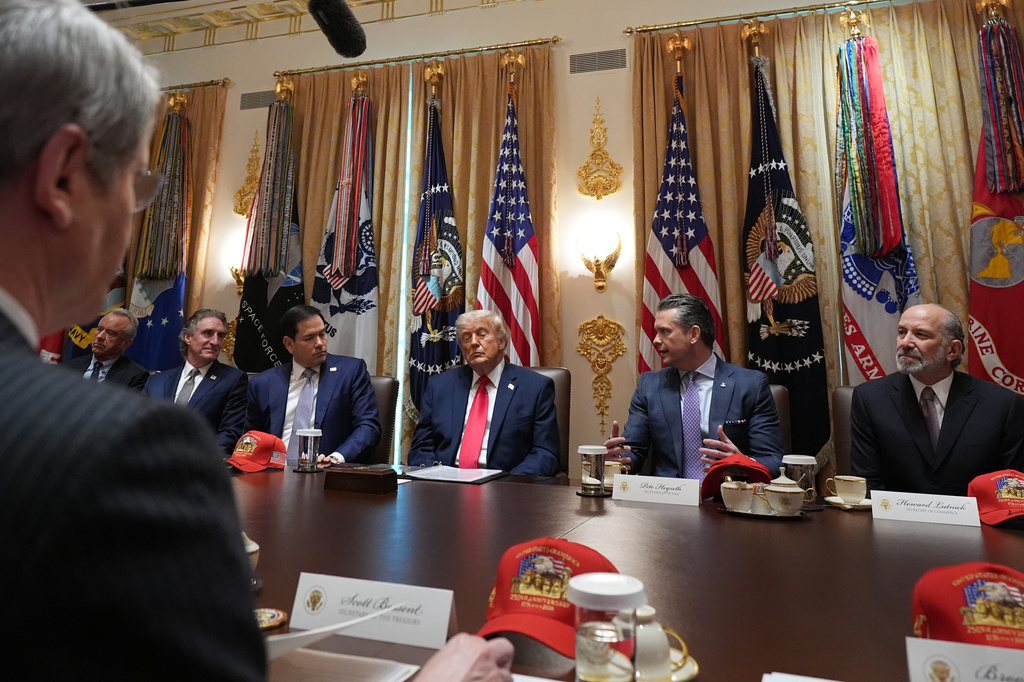 President Donald Trump, center, attends a Cabinet meeting at the White House, Wednesday, May 27, 2026, in Washington. (AP Photo/Jacquelyn Martin)